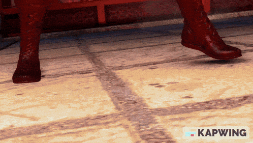 a video of a person 's feet with the word kapwing in the upper right corner