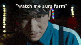 a close up of a man 's face with the words " watch me aura farm " above him