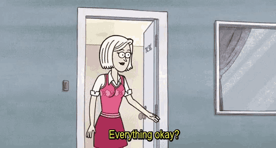 a woman in a pink dress is standing in front of a door and says everything okay