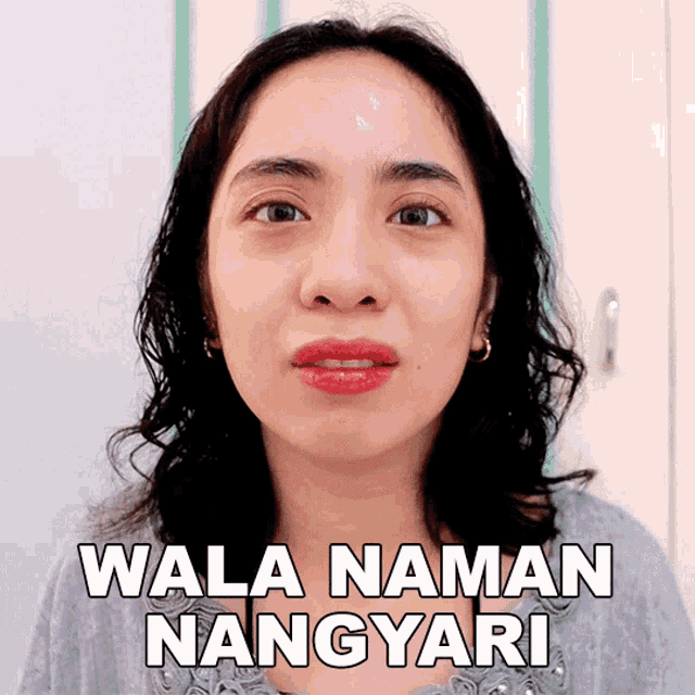 a woman 's face with the words wala naman nangyari above it