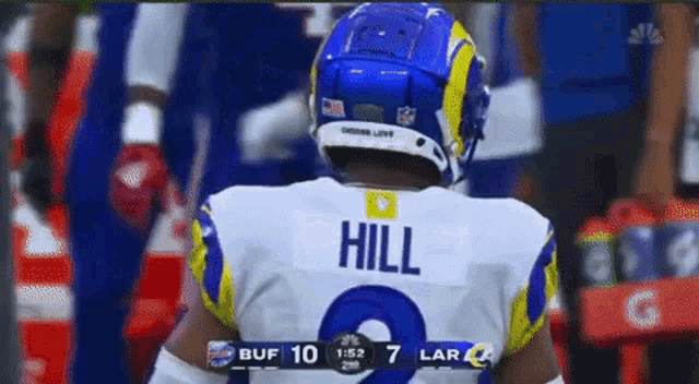 a football player wearing a helmet with the name hill on it