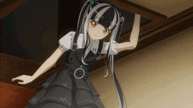 a girl in a black and white dress is standing on a staircase looking up
