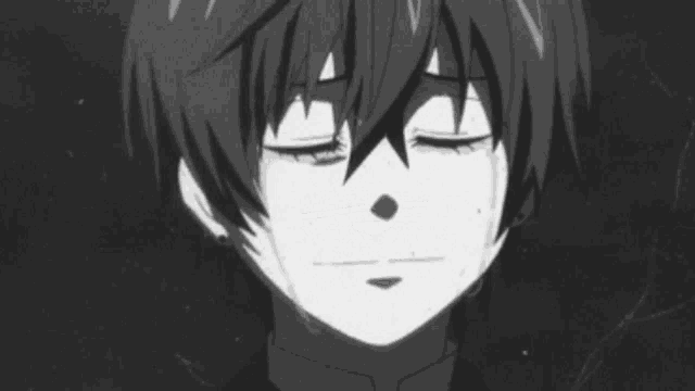 a black and white photo of a boy with his eyes closed and tears running down his face .