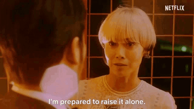 a woman is talking to a man and says i 'm prepared to raise it alone