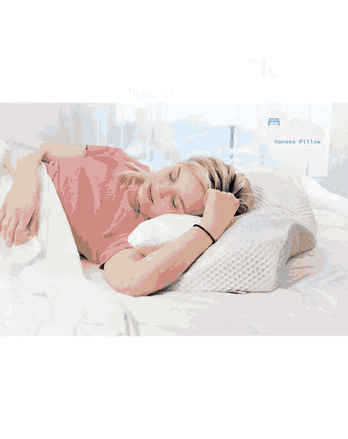 a man and a woman sleeping on a bed with a pillow