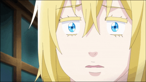 a close up of a girl 's face with blue eyes and yellow hair