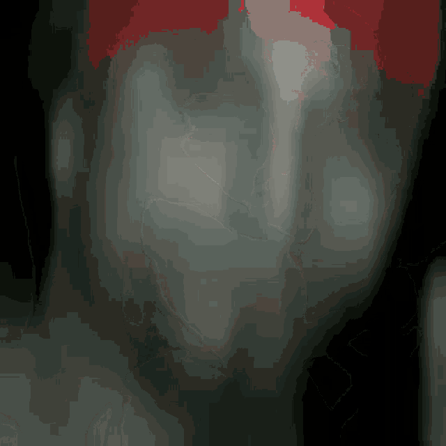 a blurry picture of a person with a red hat on