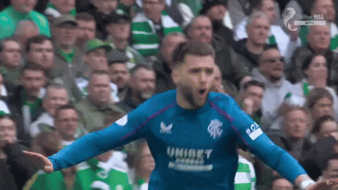 a soccer player in a blue jersey with the word umbet on it celebrates a goal