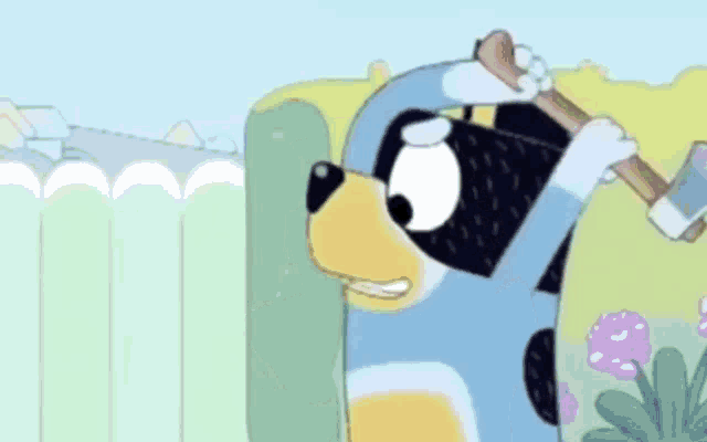 a cartoon dog is holding an axe over his head and standing next to a fence .