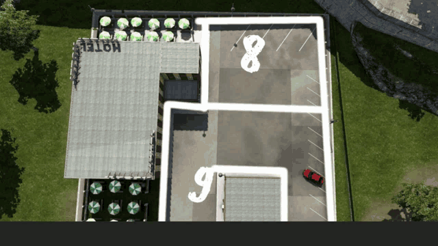 an aerial view of a hotel with the numbers 8 and 9 on it