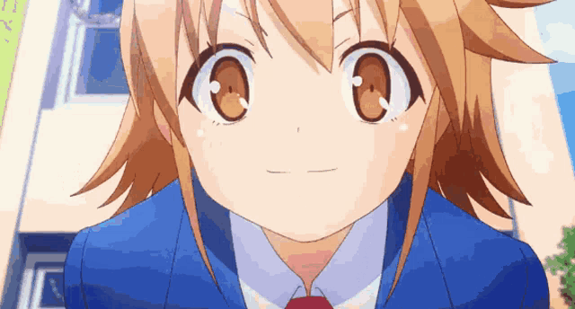 a close up of a girl 's face with a blue jacket and a red tie