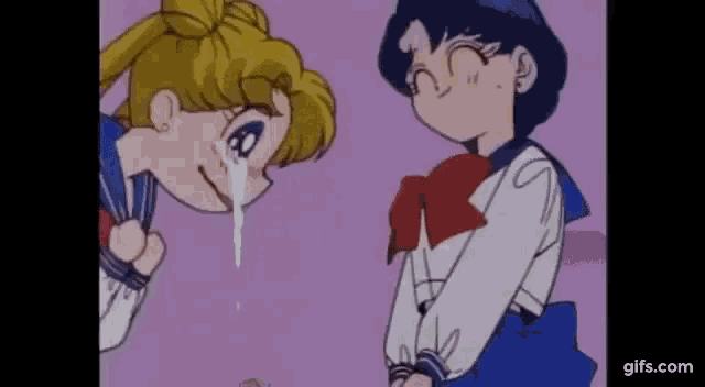 sailor moon and ariel are standing next to each other in a cartoon .