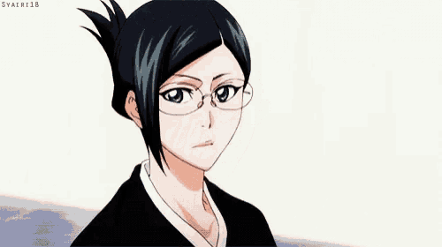 a female anime character wearing glasses is holding her head .
