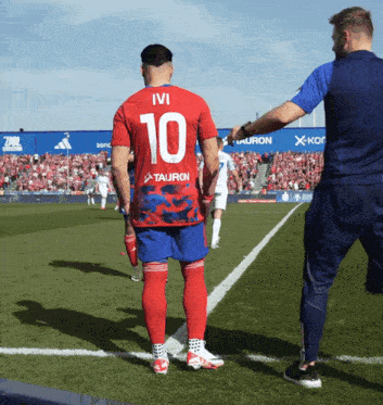 a soccer player with the number 10 on the back of his shirt