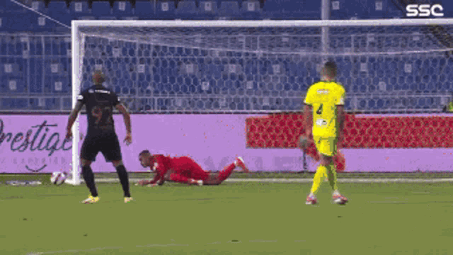 soccer players on a field with ssc written on the bottom