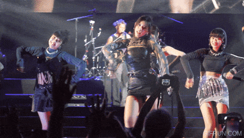 a group of women are dancing on a stage and the website ifun.com is visible in the corner
