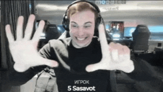 a man wearing headphones and a shirt that says 5 sasavot