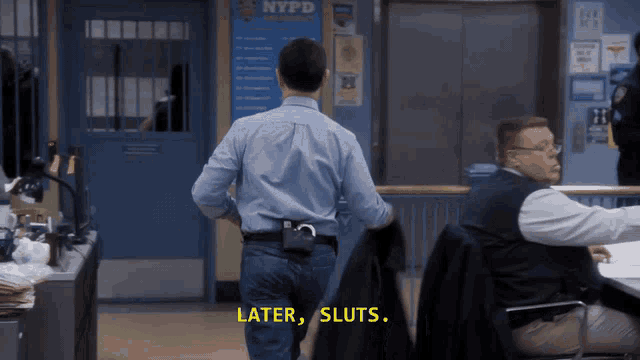 a man walking in front of a nypd sign that says later sluts