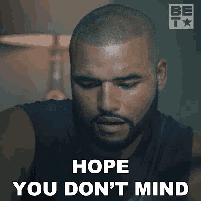 a man with a beard is saying " hope you don 't mind "