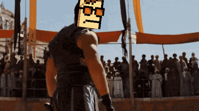 a man wearing sunglasses has a cartoon face on his head