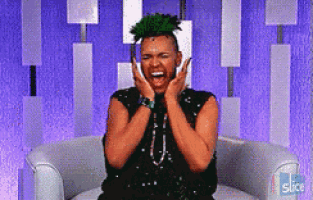 a man with a green mohawk is sitting in a chair with his hands on his face and the word slice on the bottom
