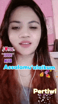 a woman is wearing ear buds and says " assalamu 'alaikum "