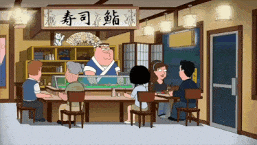 a group of people sit at tables in front of a sushi counter