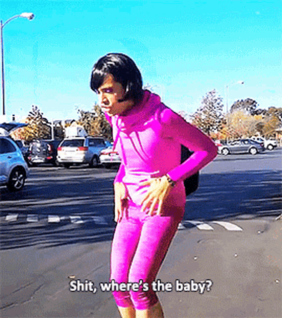 a woman in a pink outfit says shit where 's the baby on the street