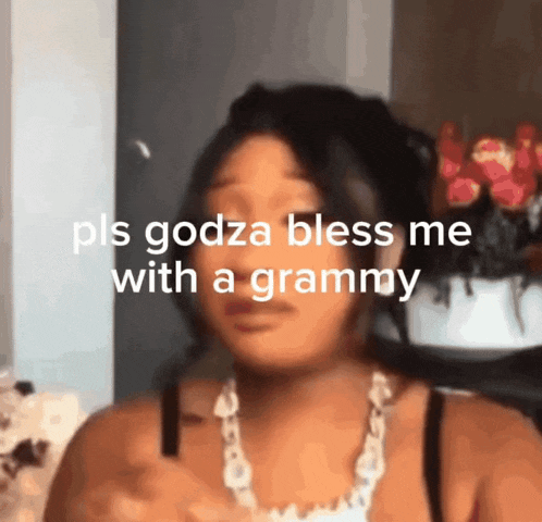 a blurry picture of a woman with the words pls godza bless me with a grammy on the bottom