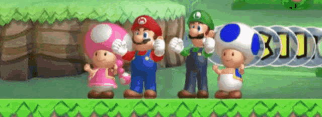 a group of video game characters are standing next to each other on a grassy field .