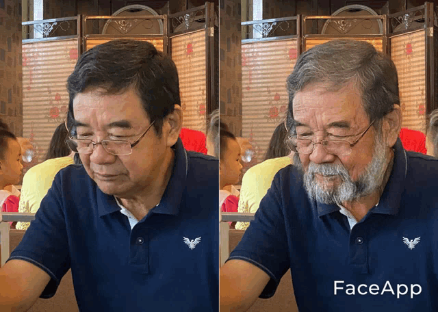 a man with glasses and a beard has a face app app on his phone