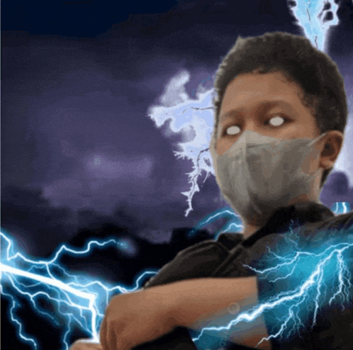 a boy wearing a mask stands in front of lightning bolts