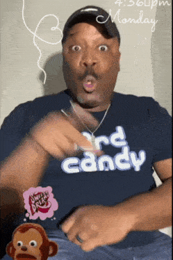 a man wearing a shirt that says " third candy " on it