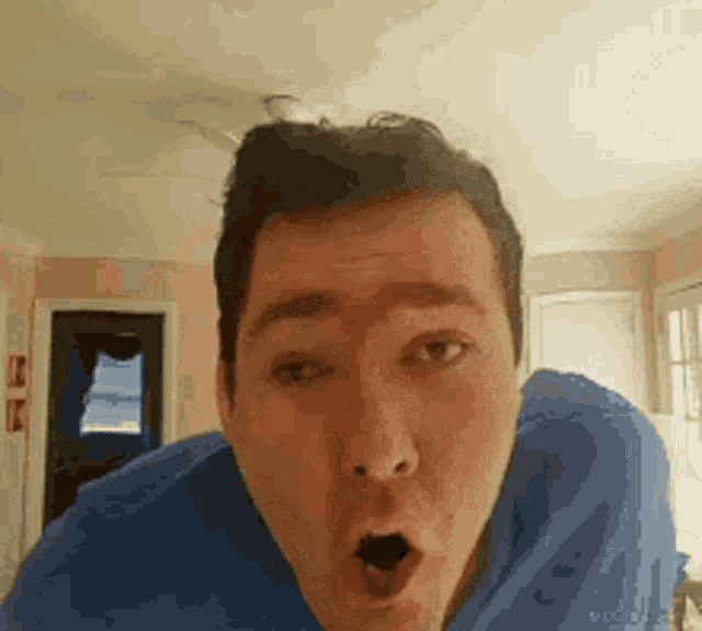 a man with a surprised look on his face