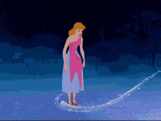 a woman in a pink dress is standing next to a trail of sparks