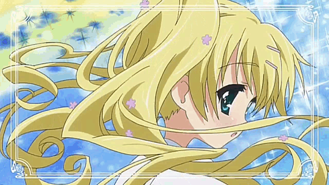 a girl with long blonde hair and blue eyes looks down