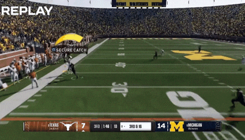 a football game between texas and michigan