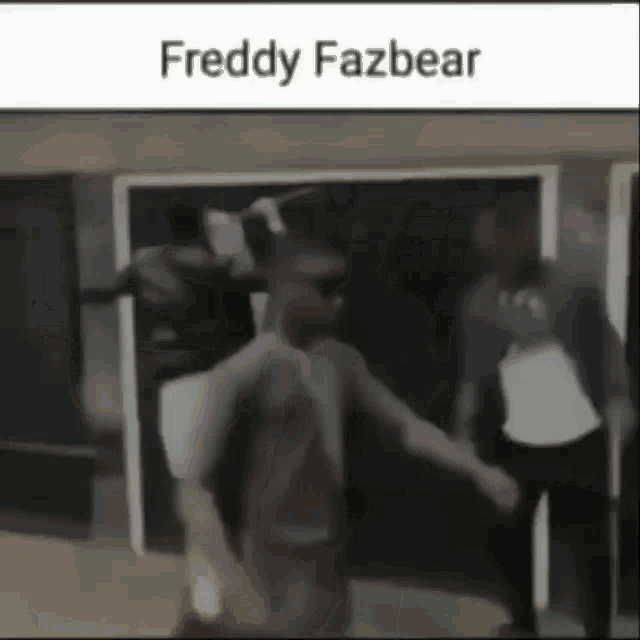 a blurry picture of freddy fazbear standing in front of a building