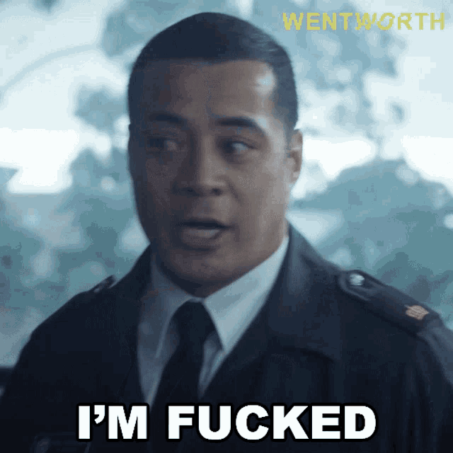 a man in a suit and tie says i 'm fucked in white letters