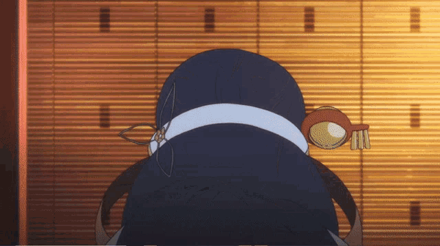 a cartoon character with a brush on his head