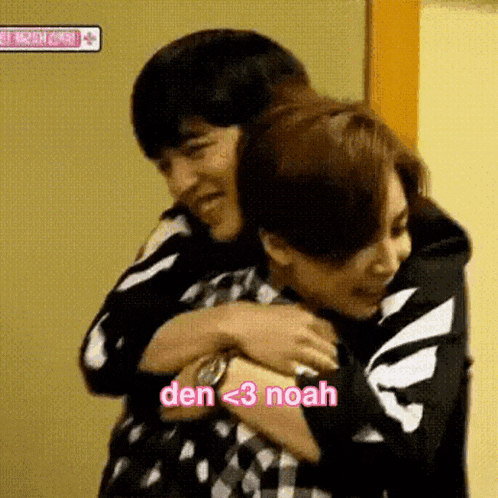 a man and a woman are hugging each other with the words `` den < 3 noah '' written on the bottom .