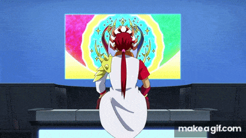 a cartoon character is sitting in front of a screen with a rainbow in the background