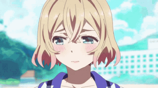 a girl with blonde hair and blue eyes is making a sad face