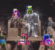 a pixelated image of a man sitting in a chair with a crown on his head