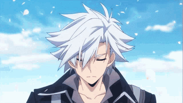 a man with white hair and a black jacket looks down