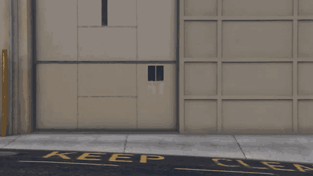 a person running in front of a building with a keep clear sign