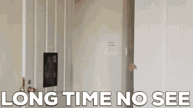 a person peeking out from behind a door with the words long time no see written on it