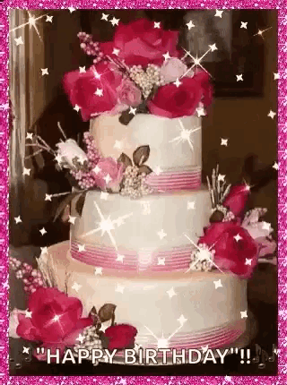 a three tiered birthday cake with pink roses and sparkles .