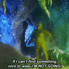 a green monster is standing in a cave with the words if i can 't find something nice to wear i 'm not going