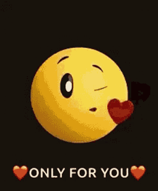 a yellow smiley face is holding a red heart in its mouth .